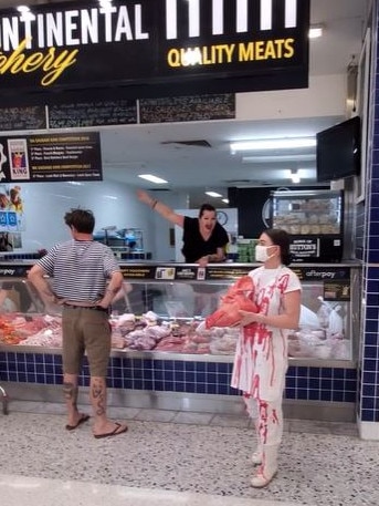 Staff at a butcher yell at Ms Peterson to leave during one of her confronting protests. Picture: Supplied