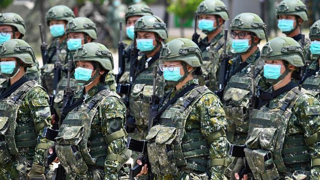 Taiwanese soldiers listen to an address by Taiwan President Tsai Ing-wen on April 9, 2020. Picture: Sam Yeh / AFP.