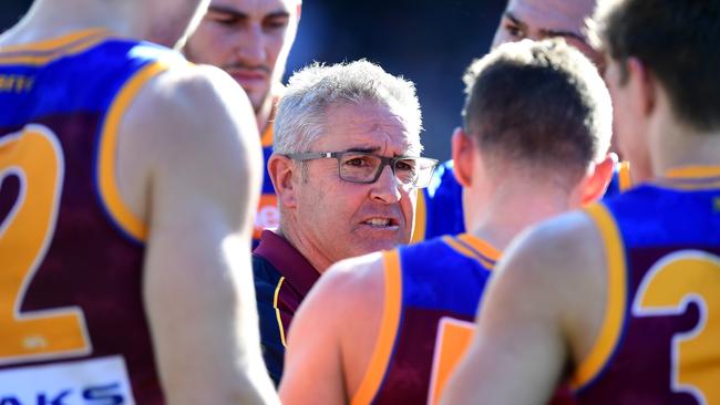 Fagan talks to his players during last week’s game against Geelong. Picture: Getty Images