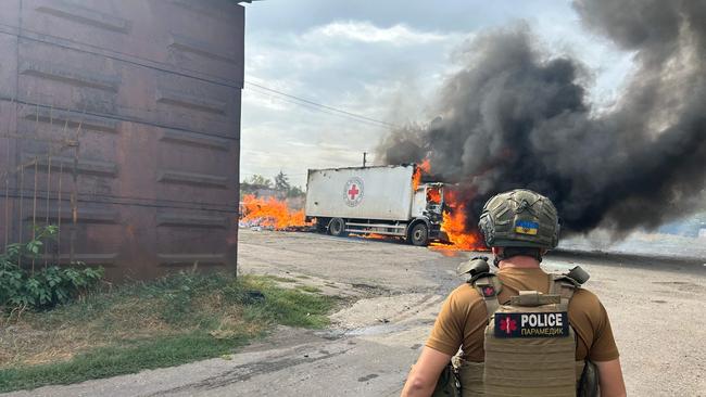 Flames engulf ICRC vehicles in the village of Virolyubivka in Donestk. Picture: National Police of Ukraine via AFP