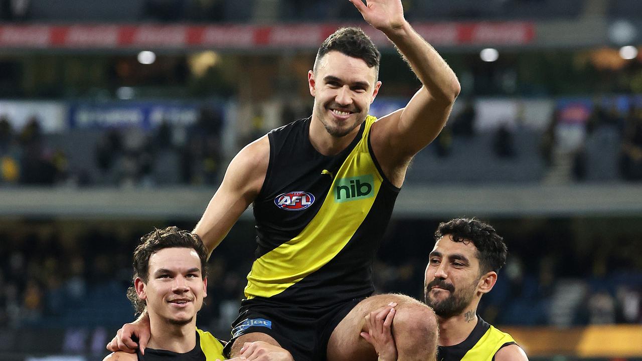 2022 AFL Football Round 20 - Richmond Tigers V Brisbane Lions at the MCG. Shane Edwards is chaired off by Daniel Rioli and Marlion Pickett. Picture: Mark Stewart