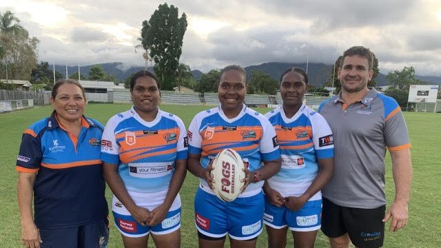 Northern Pride girls from the Torres Strait. Left is coach Flori, Alicia Bowie, Elizabeth Hosea and Melissa Hosea, with Joel Reithmuller.