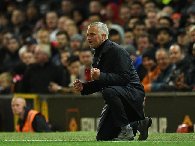 Manchester United's Portuguese manager Jose Mourinho gestures during the English Premier League football match between Manchester United and Newcastle at Old Trafford in Manchester, north west England, on October 6, 2018. (Photo by Oli SCARFF / AFP) / RESTRICTED TO EDITORIAL USE. No use with unauthorized audio, video, data, fixture lists, club/league logos or 'live' services. Online in-match use limited to 120 images. An additional 40 images may be used in extra time. No video emulation. Social media in-match use limited to 120 images. An additional 40 images may be used in extra time. No use in betting publications, games or single club/league/player publications. /