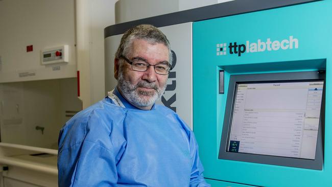 Professor Nigel McMillan holding samples. Picture: Jerad Williams