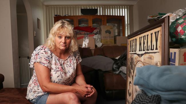 Tina Cragg of Risdon Vale has now had to resort to living in her lounge room with her two sons because of the mould in their housing home. Picture: Nikki Davis-Jones