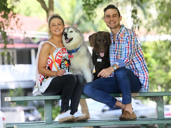 Hugo Toovey and his partner Amber Madgwick with dogs Iggy and Ernie. Picture: AAP/Richard Waugh