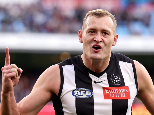 MELBOURNE, AUSTRALIA - JUNE 10: Nathan Kreuger of the Magpies celebrates a goal during the round 13 AFL match between Collingwood Magpies and Melbourne Demons at Melbourne Cricket Ground, on June 10, 2024, in Melbourne, Australia. (Photo by Jonathan DiMaggio/Getty Images)