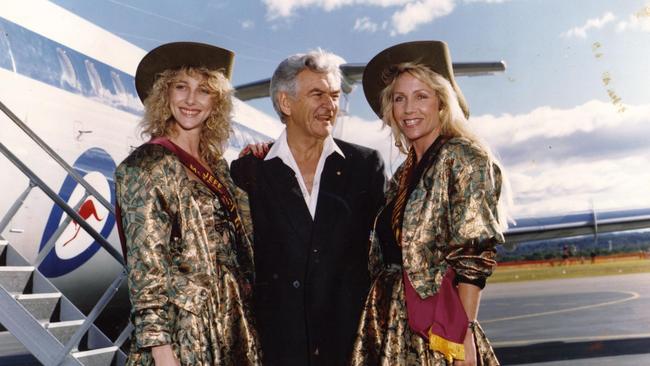 Bob Hawke posing for a photo with two Meter Maids. Picture: Supplied