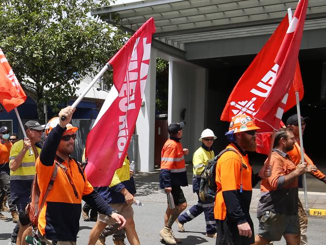 CFMEU union members march down Grafton Street, calling on the $6 billion superannuation fund for construction workers to be protected. Picture: Brendan Radke