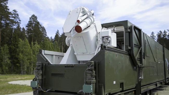 A Russian military truck with a laser weapon mounted on it is shown at an undisclosed location in Russia in 2018. Picture: AP.