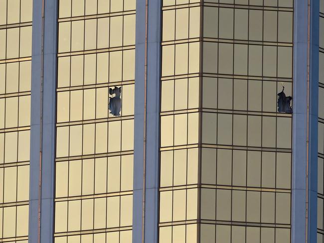 Broken windows are seen on the 32nd floor of the Mandalay Bay Resort and Casino after a lone gunman opened fired on a country music festival, killing 59. Picture: Getty