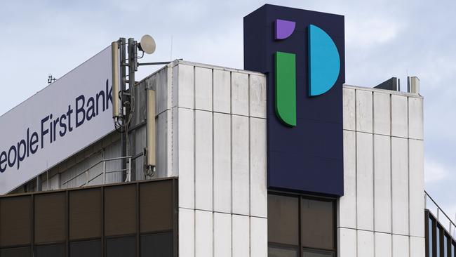 Heritage Bank head office building in Ruthven St now displays the merged rebranded name of People First Bank, Friday, June 21, 2024. Picture: Kevin Farmer