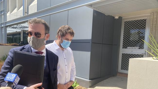 Hayden Jappe (white shirt) with lawyer Rodney Keyte (suit) leaving Southport court.