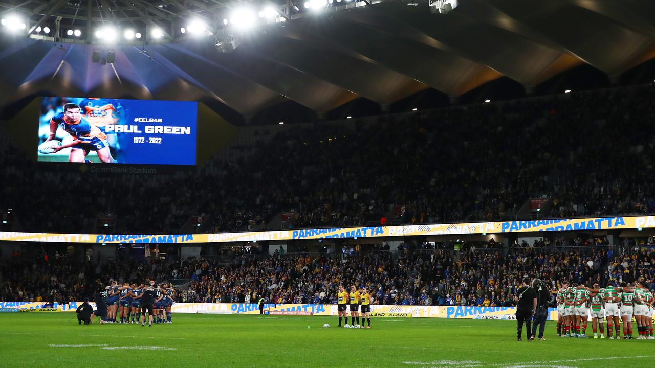 Players pay their respect during a minute’s silence for Paul Green before the round 22 NRL match between the Parramatta Eels and the South Sydney Rabbitohs at CommBank Stadium. Picture: Getty Images