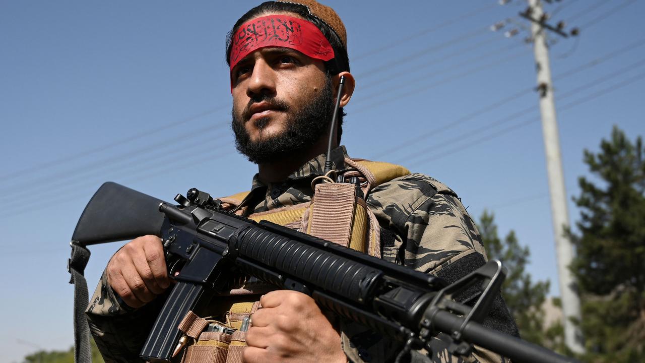 A Taliban fighter stands guard along a road in Kabul on September 9. Picture: WAKIL KOHSAR / AFP