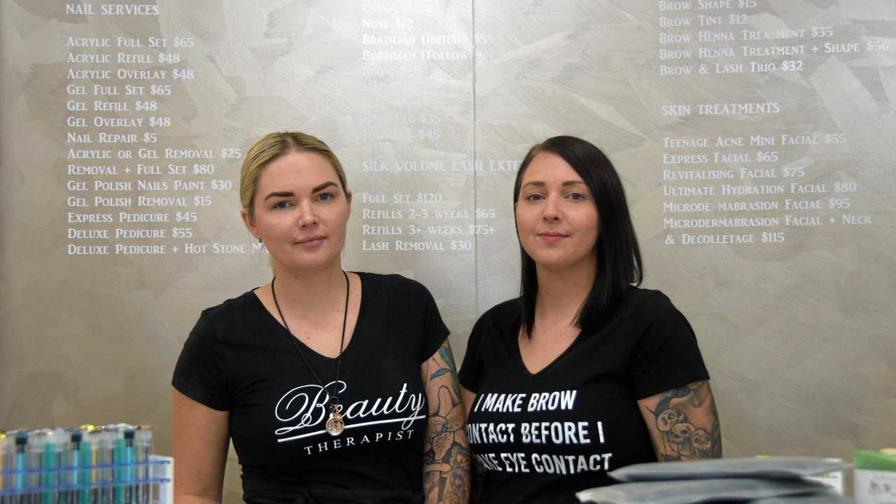 SISTER ACT: Brodie and her sister Tegan behind the desk of their recently opened Nailed It Beauty Parlour. Picture: Maddelin McCosker