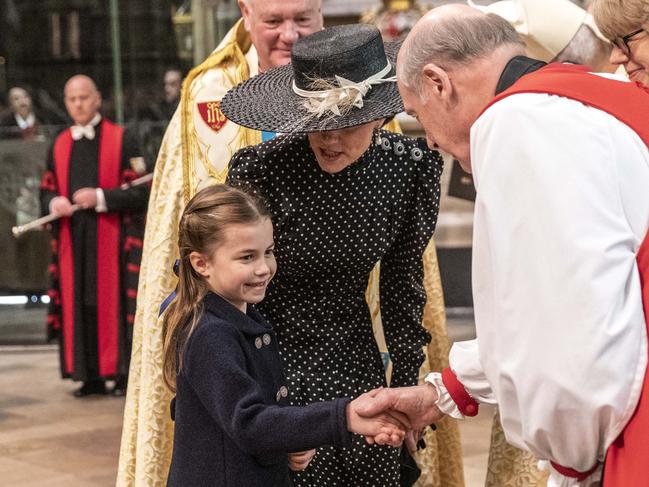 Princess Charlotte making small talk the Archbishop of Canterbury Justin Welby. Picture: Richard Pohle – WPA Pool/Getty Images.