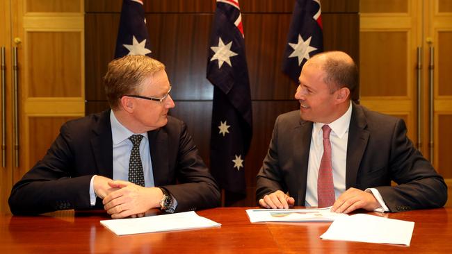 RBA Governor Philip Lowe (left) meets with Treasurer Josh Frydenberg in Melbourne today. Picture: David Geraghty