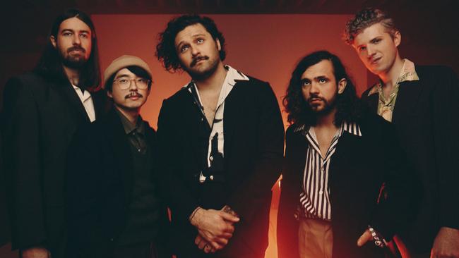 Gang of Youths, the Sydney-born rock band which has a global appeal to rival the likes of Silverchair and INXS. L-R: Max Dunn (bass), Jung Kim (keys/guitar), David Le'aupepe (vocals/guitar), Donnie Borzestowski (drums) and Tom Hobden (violin/guitar/keys). Picture: Ed Cooke