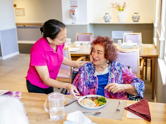 Juniper in WA was rated the highest for its food in the country, with 100 per cent of residents, always likeing their meals. Juniper multi-skilled carer Maribel Palomar-Sarte with Juniper resident Diana Allen. Supplied