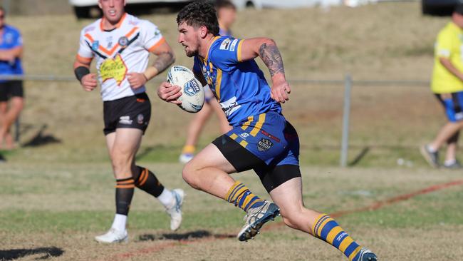 Bradley Bishop No.13 on the charge for Campbelltown City. Picture: Steve Montgomery