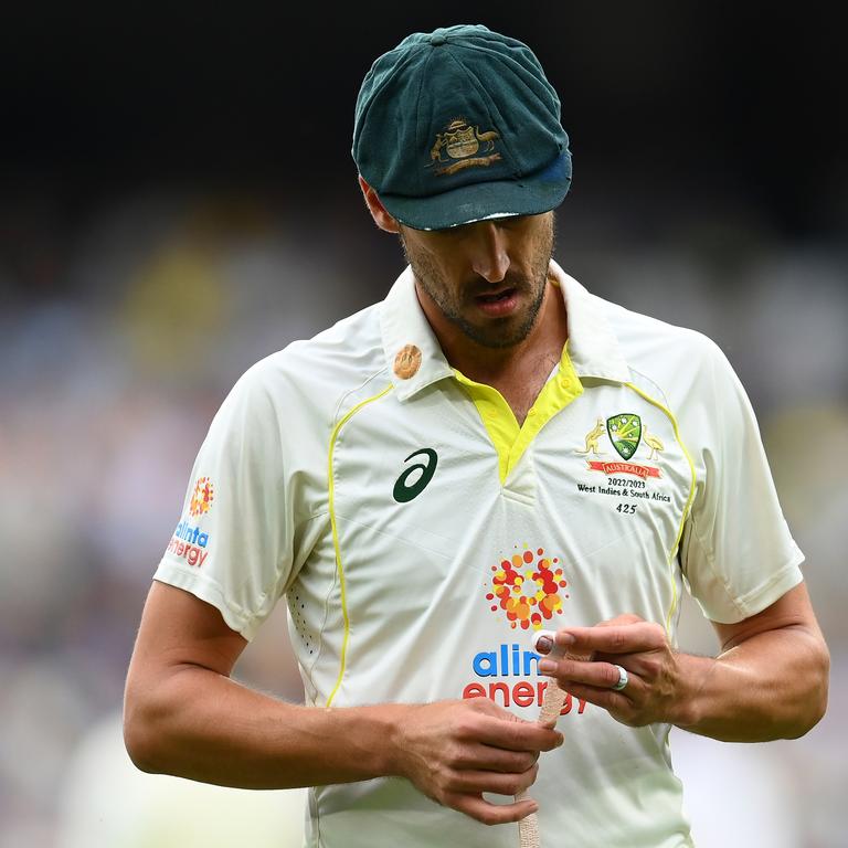 Mitch Starc checks out his injury after being hurt during the Boxing Day Test.