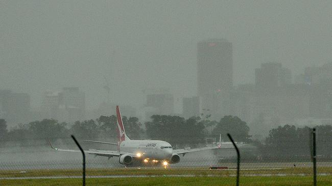 A rainy morning at Adelaide Airport. Picture: Mark Brake