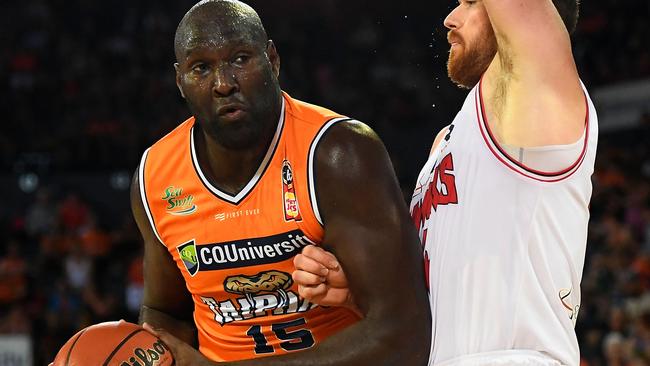 CAIRNS, AUSTRALIA - OCTOBER 21: Nathan Jawai of the Taipans drives to the basket past Brian Conklin of the Hawks during the round two NBL match between the Cairns Taipans and the Illawarra Hawks at Cairns Convention Centre on October 21, 2018 in Cairns, Australia. (Photo by Ian Hitchcock/Getty Images)