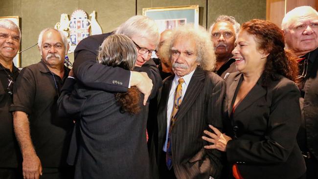 Former prime ministerKevin Rudd hugs members of the Stolen Generation on the seventh anniversary of the apology.