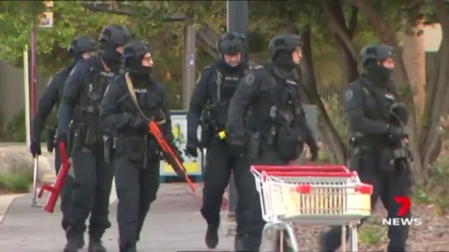 Siege at Parkside after police assaulted (7 News)