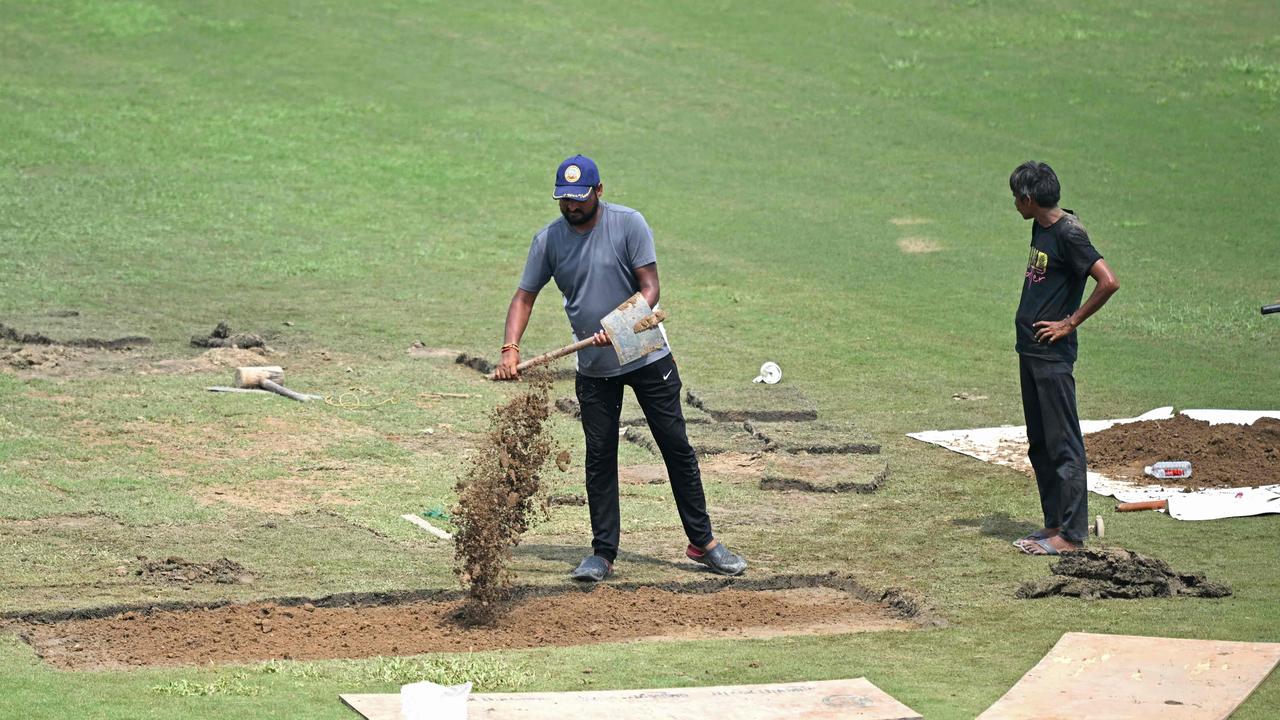 Farcical scenes unfolded on the ground. (Photo by Money SHARMA / AFP)