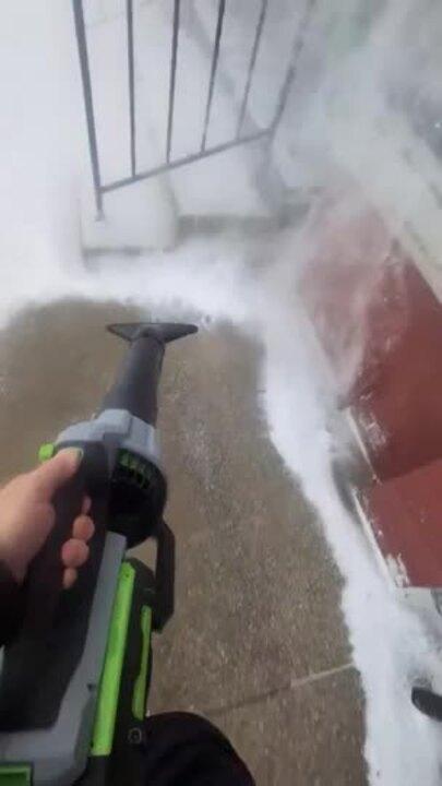 Indiana Barber Uses Leaf Blower to Clear Snow in Front of Shop