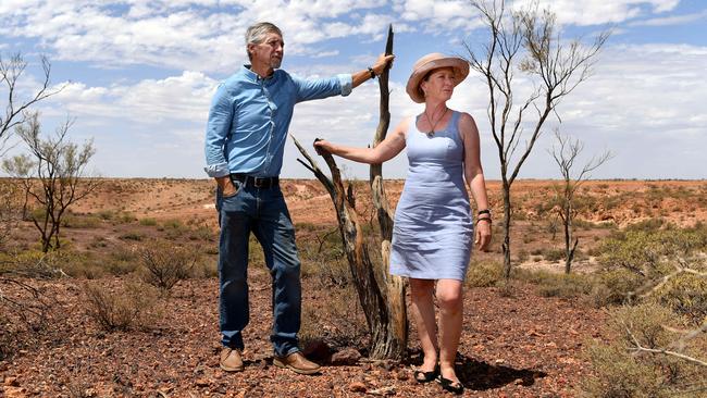 Pastoralists John Knight and partner Caroline Thomas from Evelyn Downs station pictured at The Breakaways, outside Coober Pedy. Picture: Tricia Watkinson