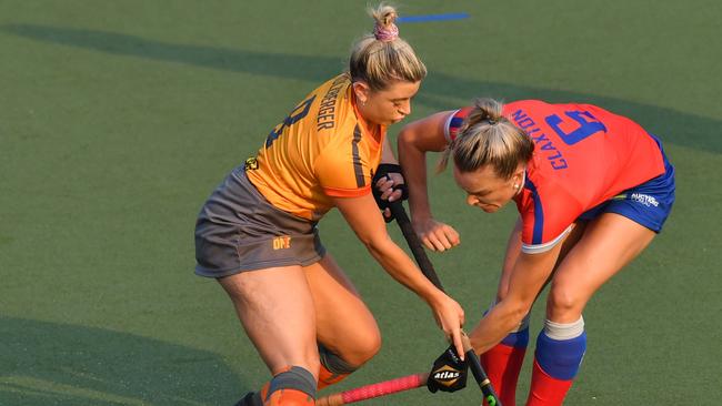 Brisbane Blaze’s Jordyn Holzberger (L) takes on SA Fire’s Jane Claxton (R) during the 2019 Hockey One women’s semi-final at Queensland State Hockey Centre in November. Picture: AAP. /Darren England