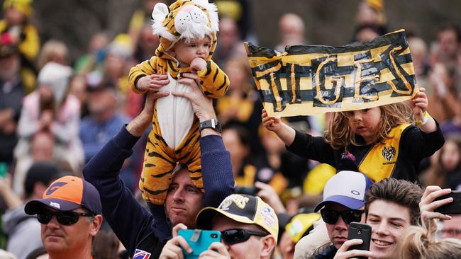 Tiger fans young and old turned out for the AFL Grand Final Parade. Picture: AAP