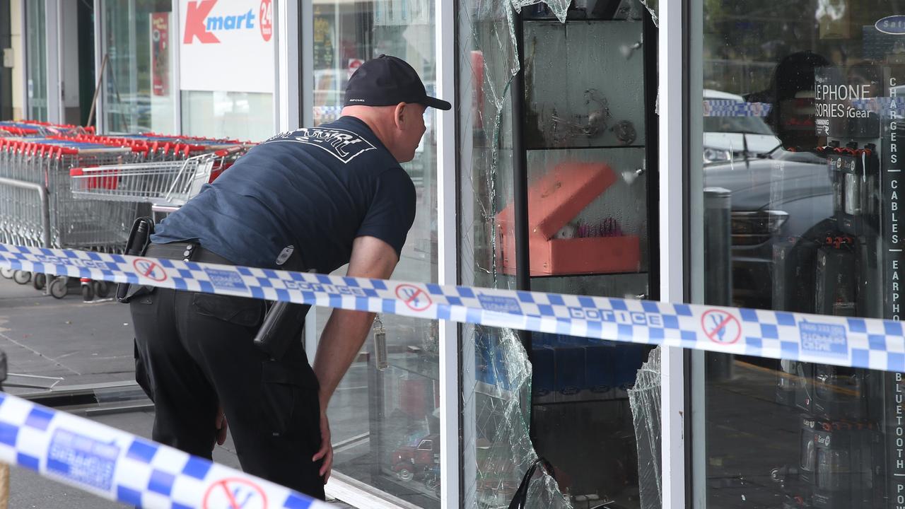 Police investigating a suspicious fire at tobacco store near Kmart in Belmont. Picture: Alan Barber