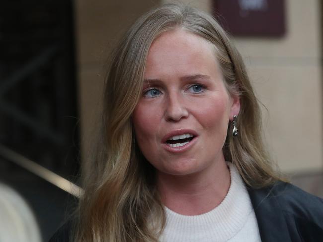 Monica Smit leaving the Melbourne Magistrate Court after she was charged by Consumer Affairs Victoria with breaching the fundraising act. Picture: David Crosling