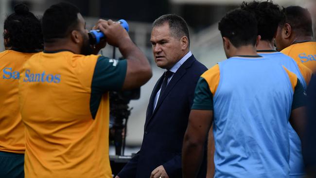 Dave Rennie (C) was shown the door by the Wallabies, in an effort to bring back Eddie Jones. Picture: AFP