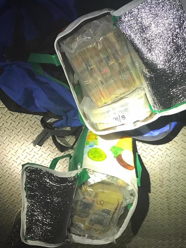 The $2.75m in cash found in shopping bags in the cab of a prime mover in Yass in April 2020. Picture: NSW Police