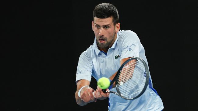 Novak Djokovic hits a return against Adrian Mannarino. Picture: AFP