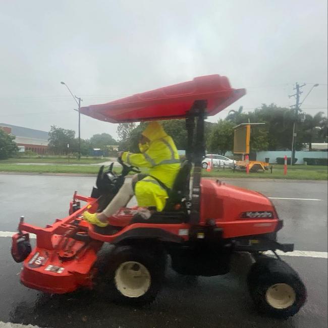 Saints Eagles Souths groundsman Steve "Scuba Steve" Stewart saving the club's lawnmower from flood waters. Picture: Saints Eagles Souths.