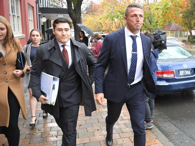 SYDNEY, AUSTRALIA - NewsWire Photos MAY 4, 2021:  Retired NRL star Sam Burgess (right) leaving Moss Vale Court with lawyer Bryan Wrench. Picture: NCA NewsWire / Simon Bullard