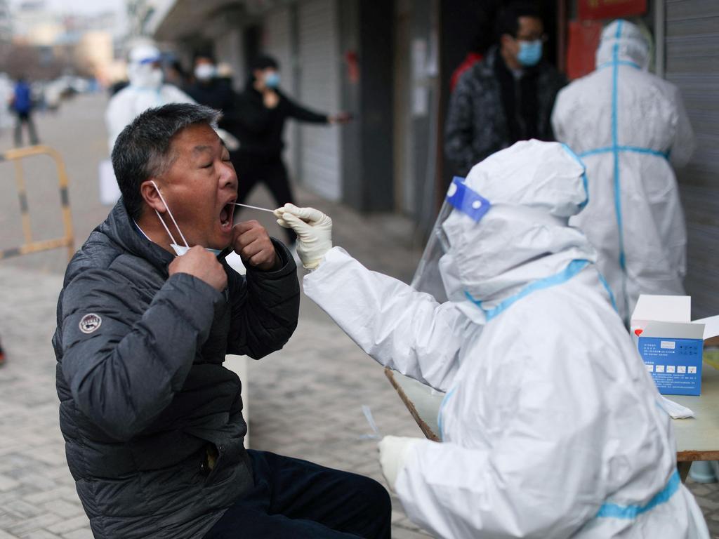 Snap lockdowns, travel restrictions, and mass testing are defining life in China. Picture: AFP