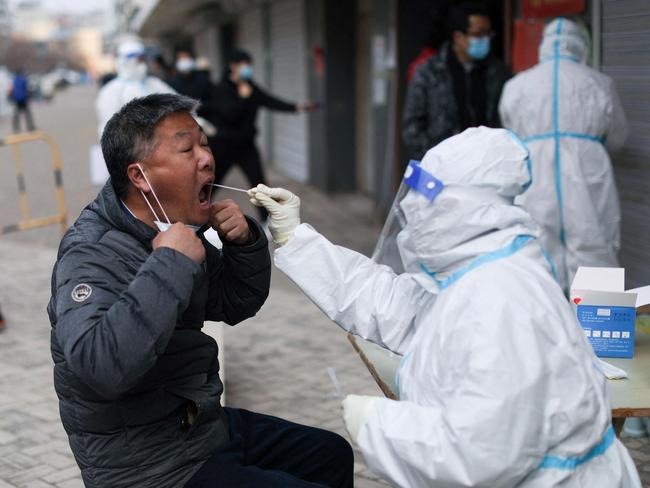 Snap lockdowns, travel restrictions, and mass testing are defining life in China. Picture: AFP