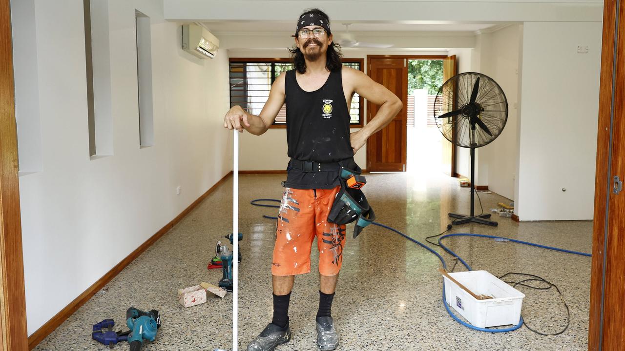 Chris King toiled in the heat to repair his flood-damaged Caravonica home after the December 17 flood. Picture: Brendan Radke