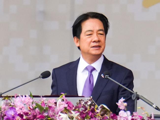 Taiwan's President Lai Ching-te delivers his address during National Day celebrations in front of the Presidential Office in Taipei on October 10, 2024. (Photo by WALID BERRAZEG / AFP)