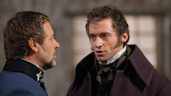 Russell Crowe as Javert (left) confronts Hugh Jackman’s Jean Valjean in Les Miserables, the 2012 film of Victor Hugo’s classic novel of the same name.