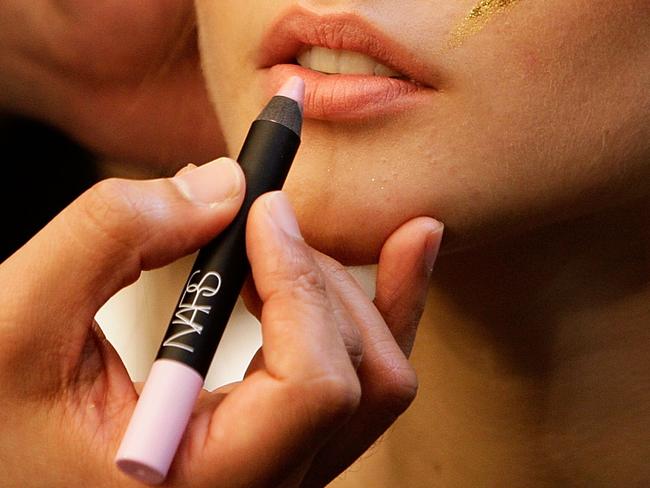 TOKYO, JAPAN - OCTOBER 17:  NARS International Lead Makeup Stylist Sada Ito works on a look backstage ahead of the Sretsis show as part of Mercedes Benz Fashion Week TOKYO 2015 S/S at Spiral Garden on October 17, 2014 in Tokyo, Japan.  (Photo by Lisa Maree Williams/Getty Images for NARS)