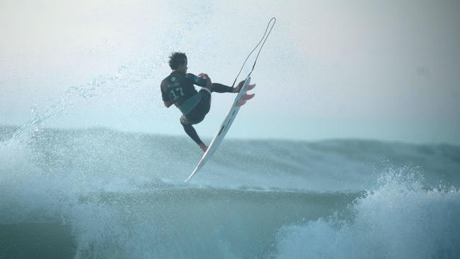 TOPSHOT - Australian surfer Julian Wilson competes during the final of the French stage of the World Surfing Championship 2018 Quiksilver Pro France in Hossegor, on October 12, 2018. (Photo by IROZ GAIZKA / AFP)