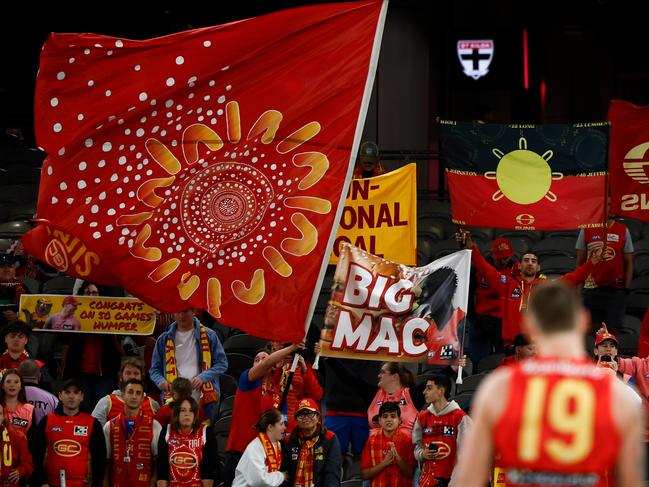 Gold Coast fans enjoy the win. Picture: Getty Images